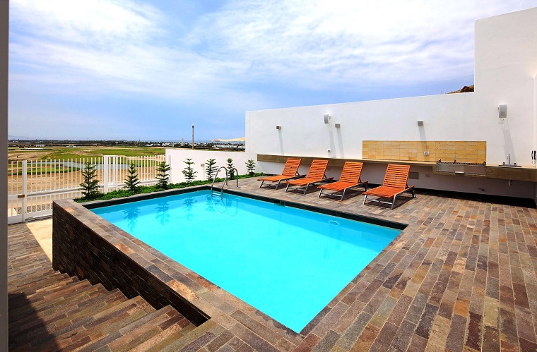idea piscina seminterrata casa esterno moderno