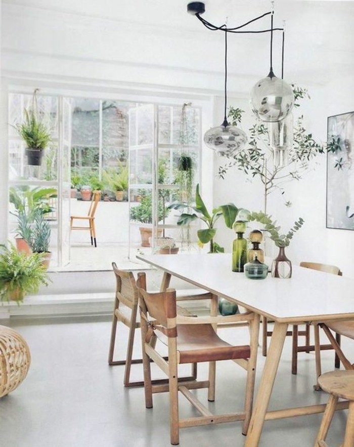 Salotti moderni e un'idea per la decorazione con tante piante verdi 