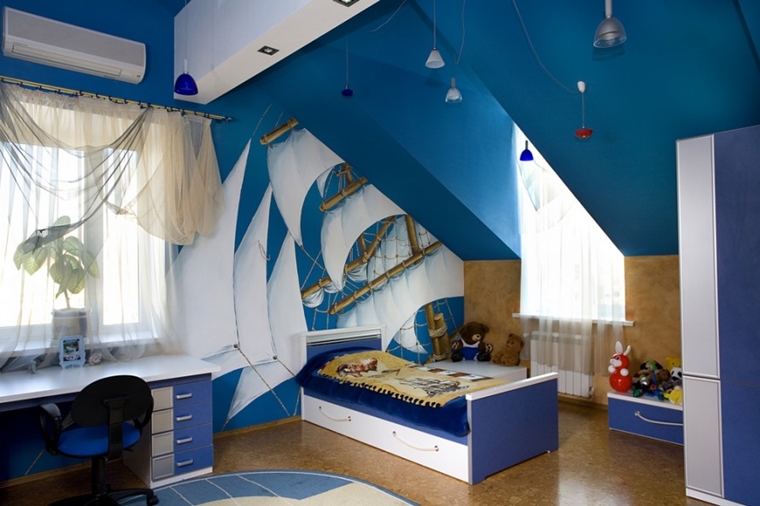 camerette bambini murales sopra letto bianco blu