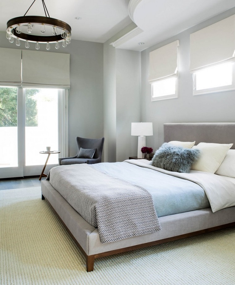 camera da letto moderna arredata tonalita colore chiaro