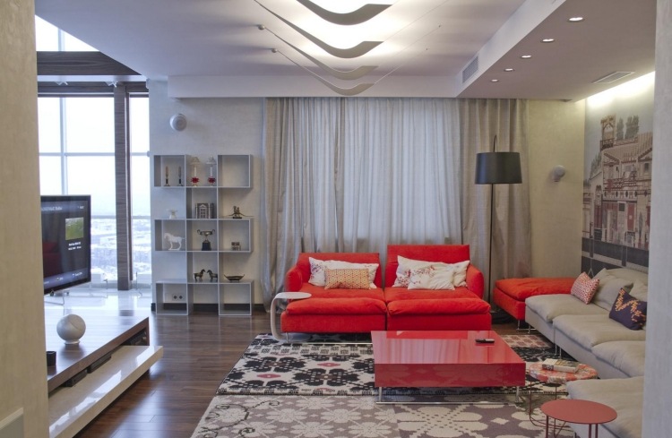saloni moderni divani grigio rosso parete decorata murales