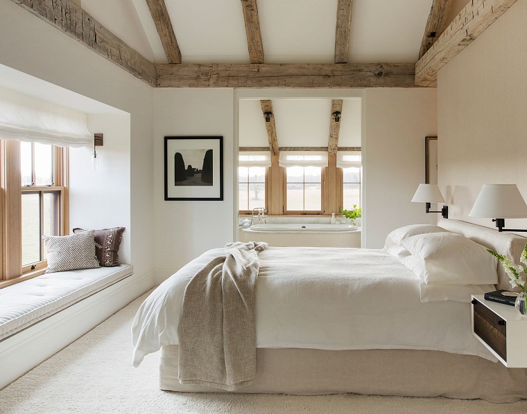 camera da letto country pareti bianche travi vista legno