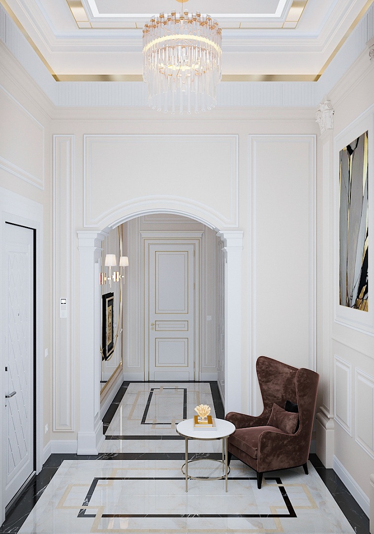 ingresso moderno poltrona con tavolino pavimento con piastrelle di marmo