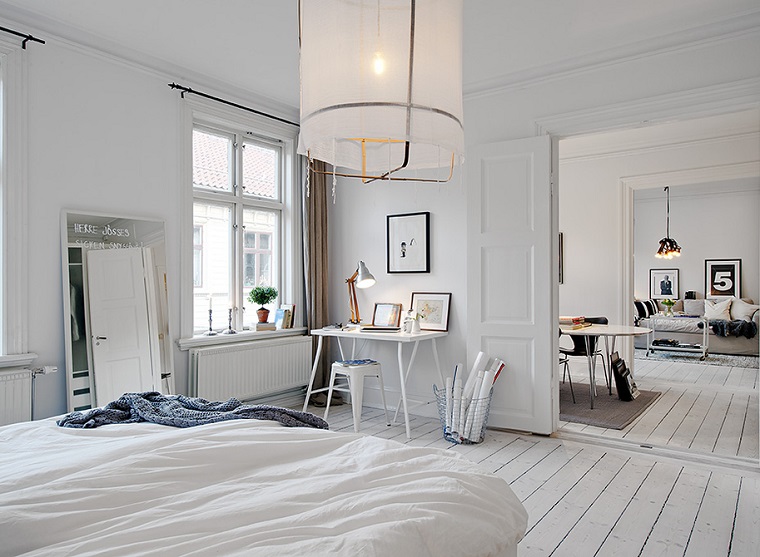 camera da letto arredata mobili bianchi design