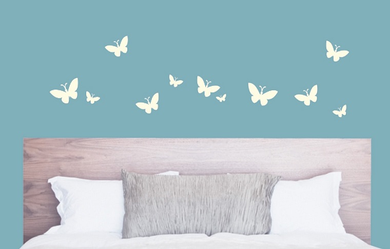 stencil muro-farfalle-bianche-testata-letto