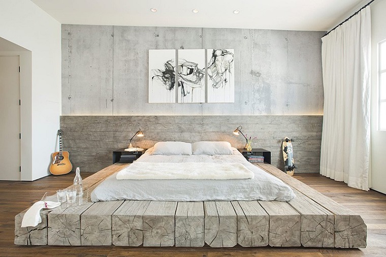 camere-da-letto-moderne-travi-legno-materasso-parete-decorazione-quadri-tende-bianche