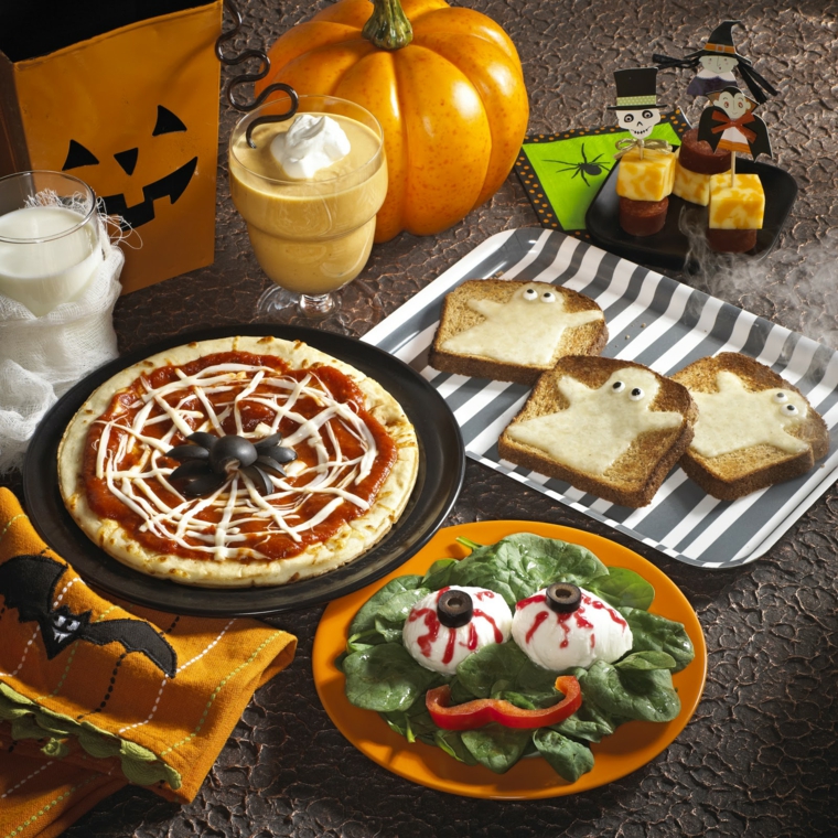 decorazione-tavolo-halloween-pizza-ragnatela-toast-fantsma-insata-occhi-zucca-tovaglia-arancione-pipistrelli