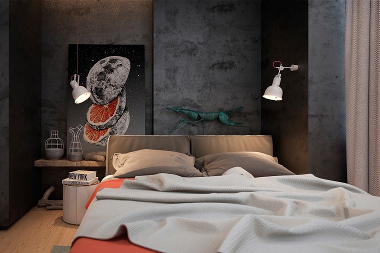 idee-camera-da-letto-parete-cemento-colore-grigio-lampada-abat-jour-biancheria-da-letto-beige-bianca-rossa