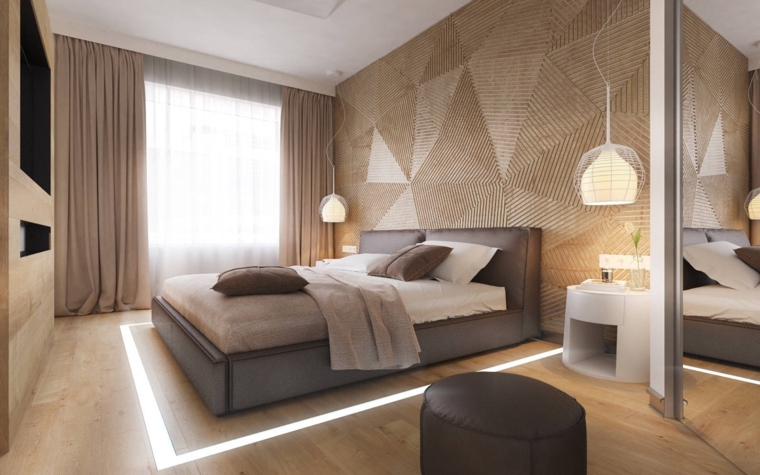 parete-forme-geometriche-lampade-sospensione-letto-colore-grigio-testata-imbottita-pavimento-legno