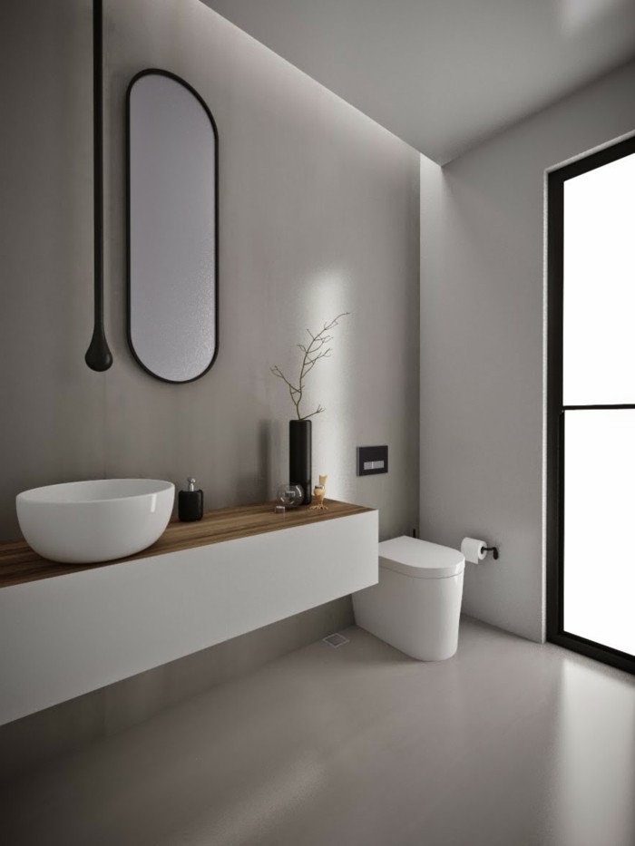 bagni-senza-piastrelle-pareti-colore-chiaro-sanitari-bianchi-moderni-grande-specchio-ovale