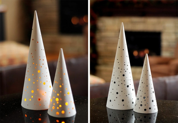 Addobbi di Natale, lanterne di metallo e di colore bianco con piccoli buchini rotondi e candela dentro 