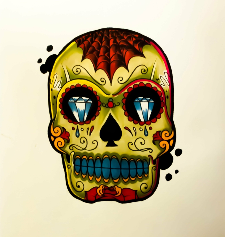 teschio messicano, idea colorata di giallo con due diamanti negli occhi e una ragnatela rossa in testa