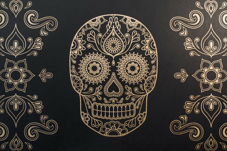 teschi messicani, proposta per realizzare un disegno o un tatuaggio con delle decorazioni a lato