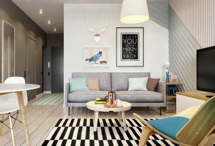 Idea per arredare un soggiorno classico con mobili in legno e accessori di design 