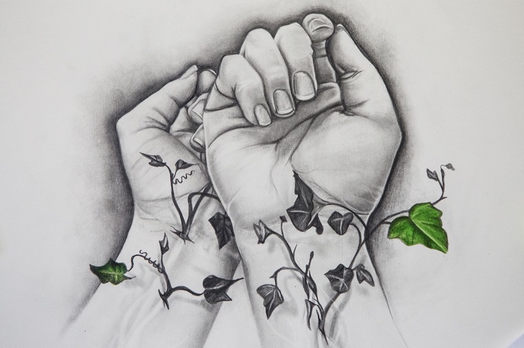 Disegno bianco e nero, disegni a matita di due mani, foglie verdi 