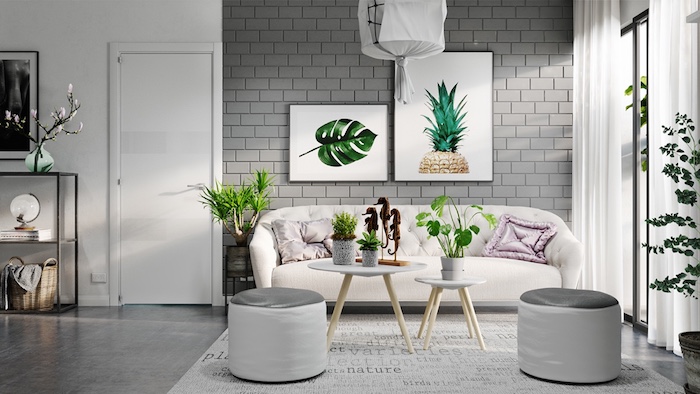 Idea colori pareti grigio in pietra, divano bianco e tappetto abbinato, decorazioni da parete con motivi floreali 