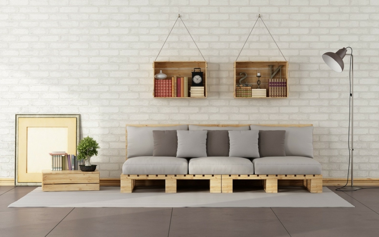 soggiorno moderno con un'idea di pallet arredamento realizzata con un divano un tavoli e delle mensole