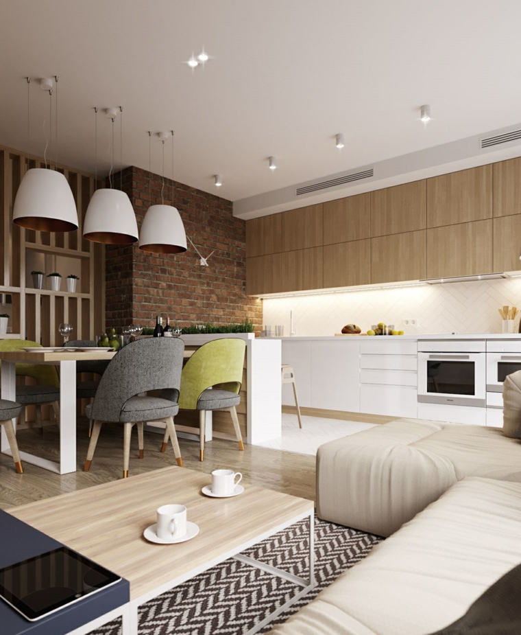 Cucina soggiorno ambiente unico, parete effetto pietra, pavimento cucina piastrelle bianche 