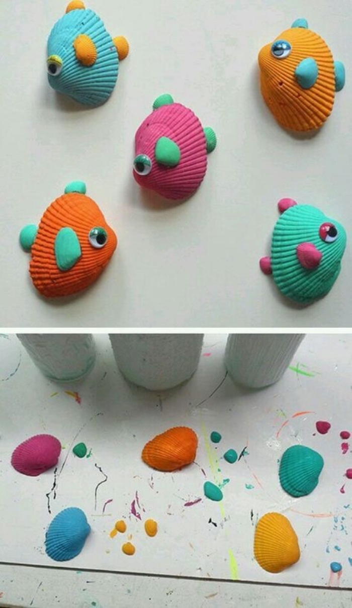 Piccoli pesciolini colorati da conchiglie dipinte con colori acrilici
