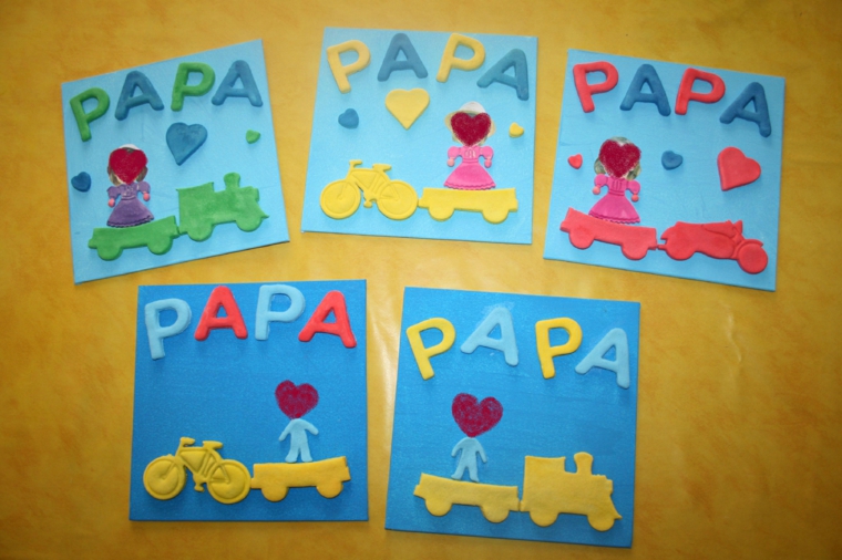 Cartoline di colore blu, disegni di macchine, scritte per il giorno del papà
