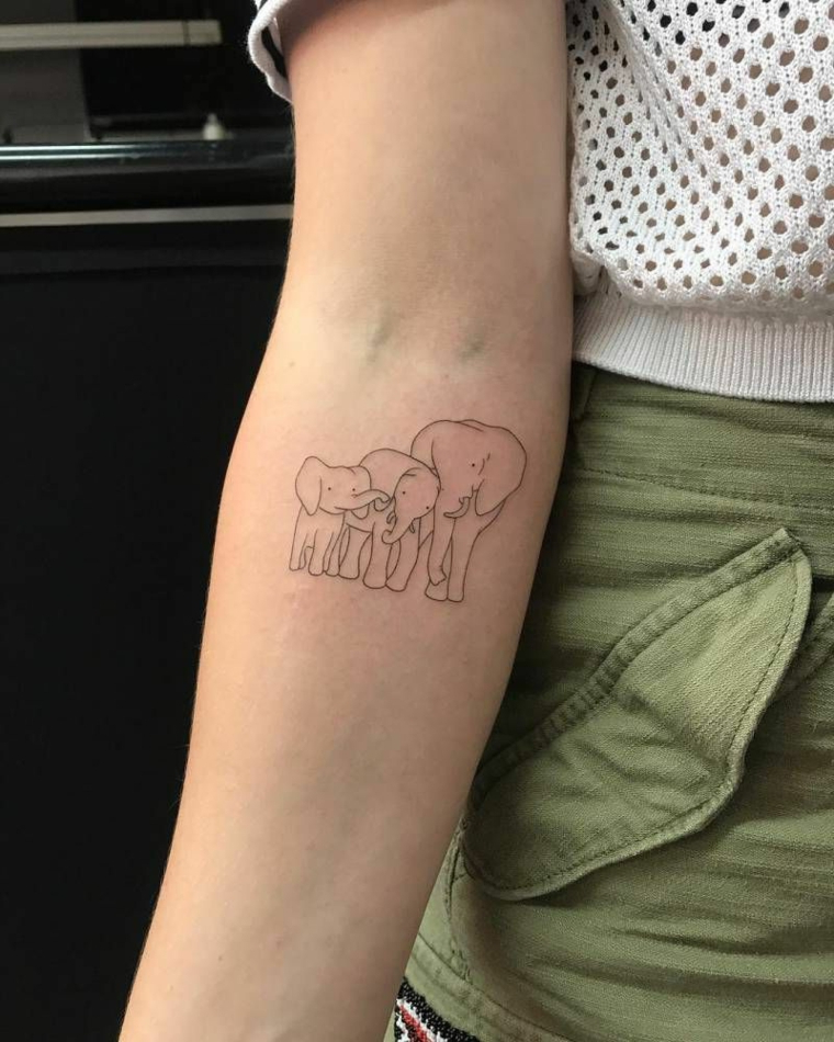 Tatuaggi famiglia, tattoo sull'avambraccio, disegni di elefanti, tattoo femminile