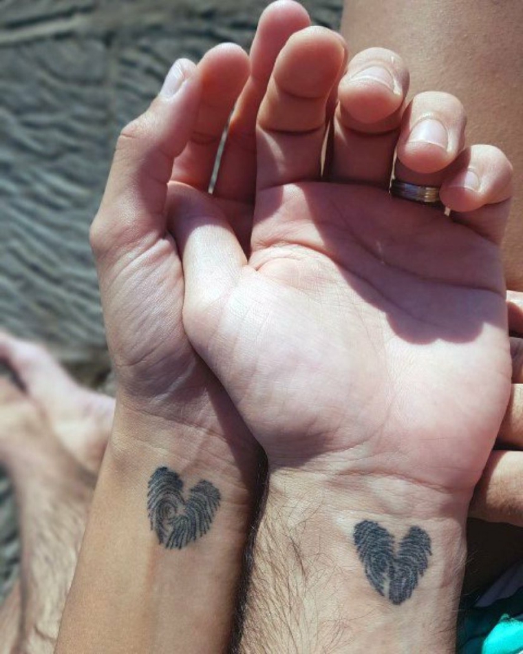 Tatuaggio di coppia, disegno tattoo cuore impronta, tatuaggi forza di andare avanti