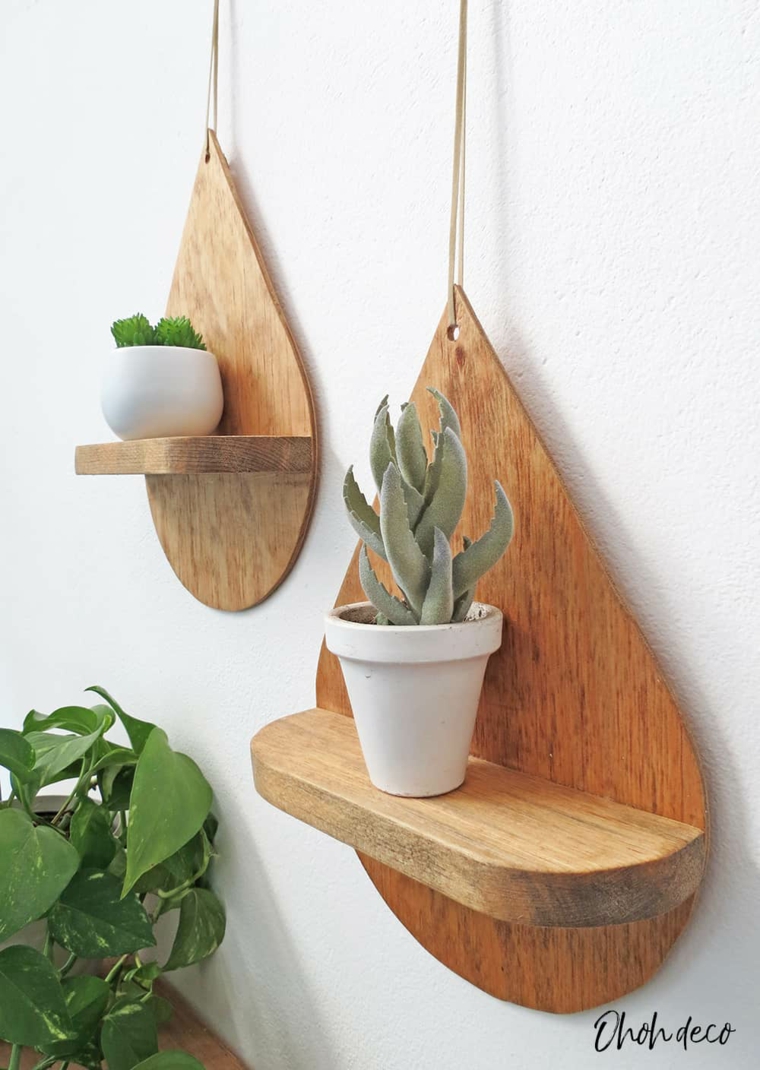 Mensole senza chiodi, pezzo di legno a forma di goccia con vasi di piante