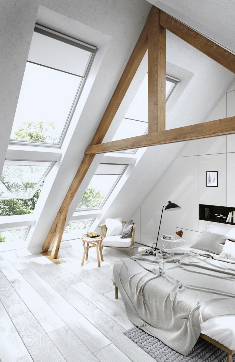 Come arredare un open space, camera da letto in mansarda, soffitto a V con travi di legno