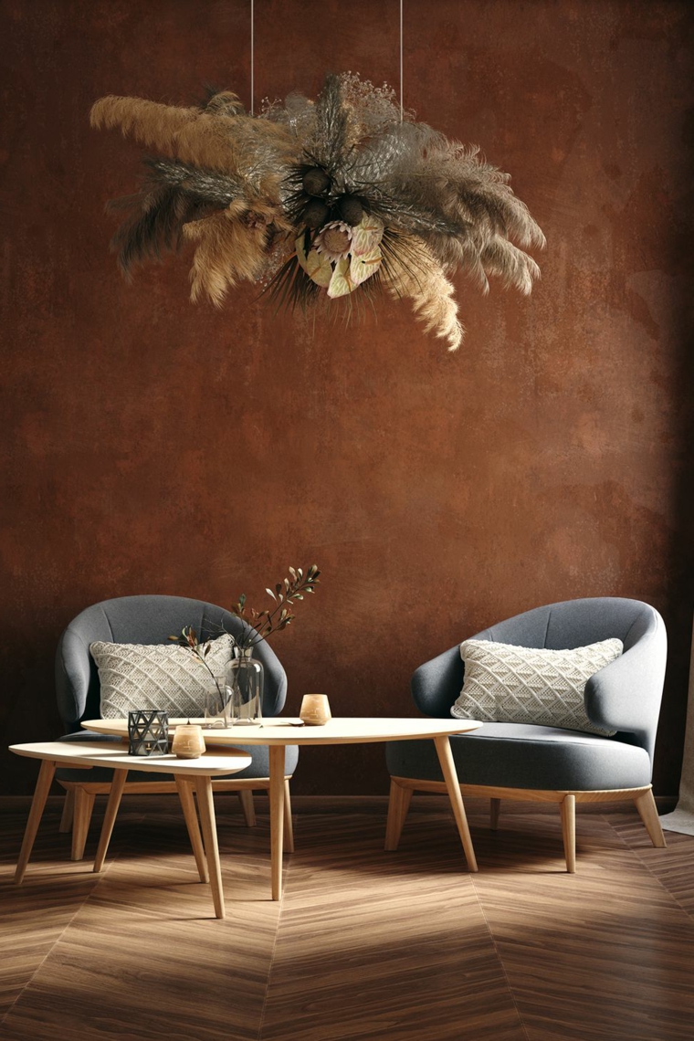 muro dipinto di marrone terra pareti colorate soggiorno arredo con poltrone e tavolino