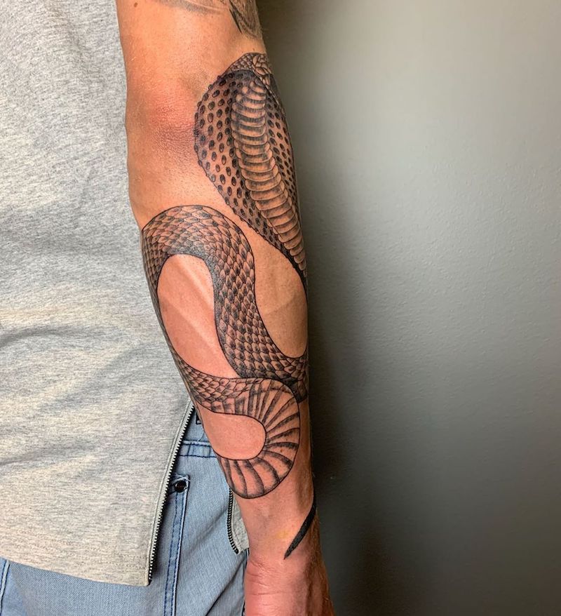 tatuaggi serpenti braccio avambraccio con tattoo