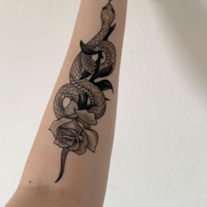 Tatuaggi serpenti braccio: ecco come scegliere quello più adatto!