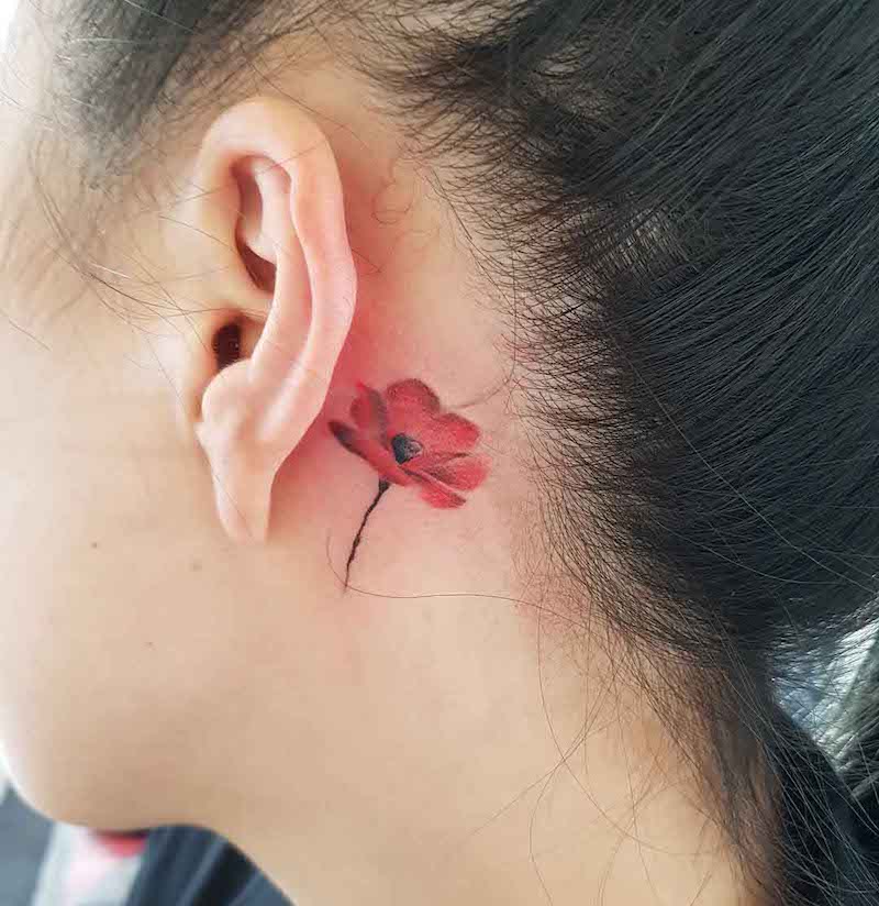 tattoo dietro l'orecchio fiore