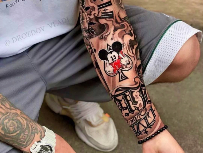Tatuaggio braccio uomo: disegni, significato e disegni da copiare!