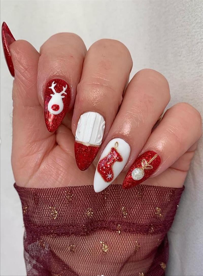 unghie rosse eleganti con smalto bianco