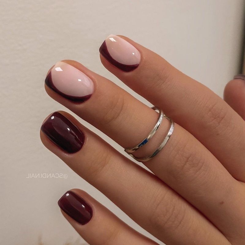 unghie di colore bordeaux con disegni