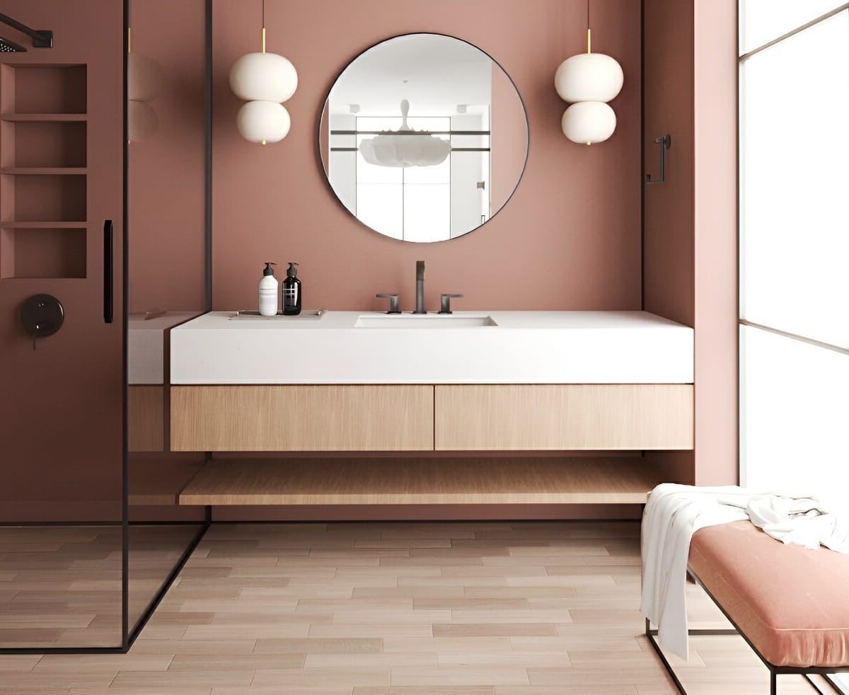 parete colore terracotta specchio rotond bagno moderno